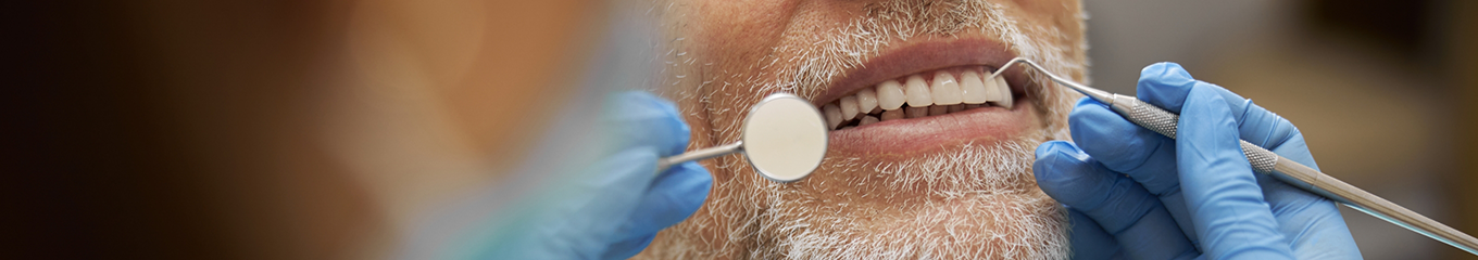 Senior man getting a dental checkup