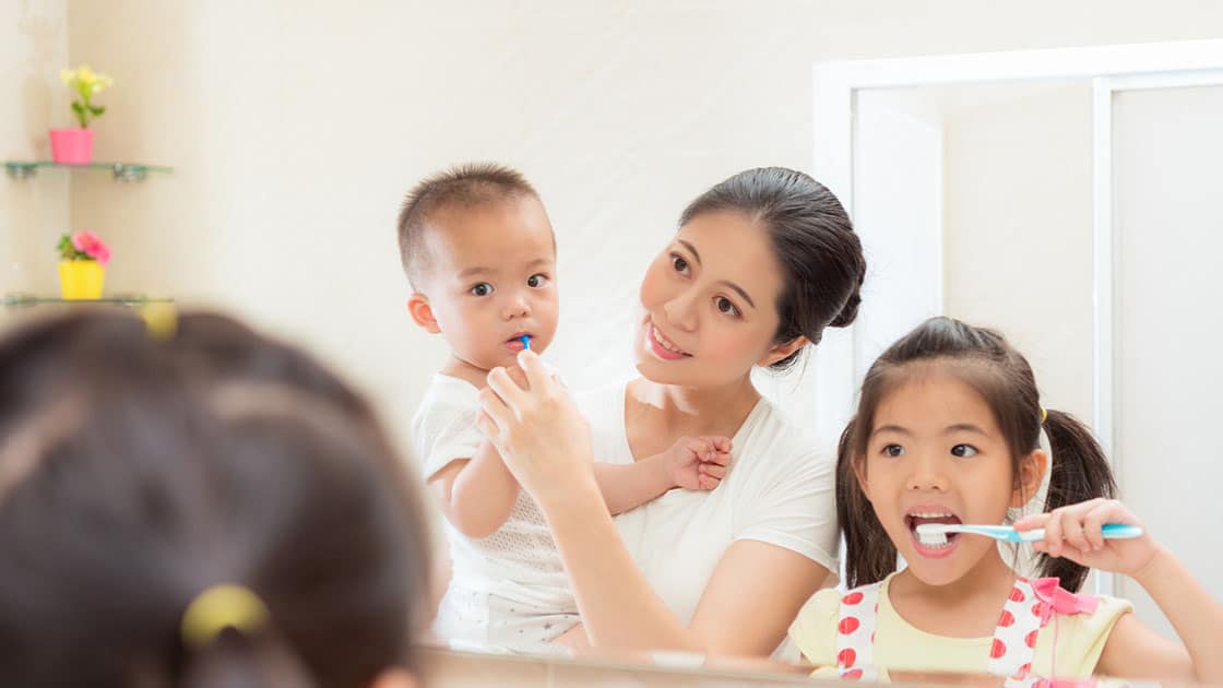 Preventive Dental Care - Family Brushing Teeth