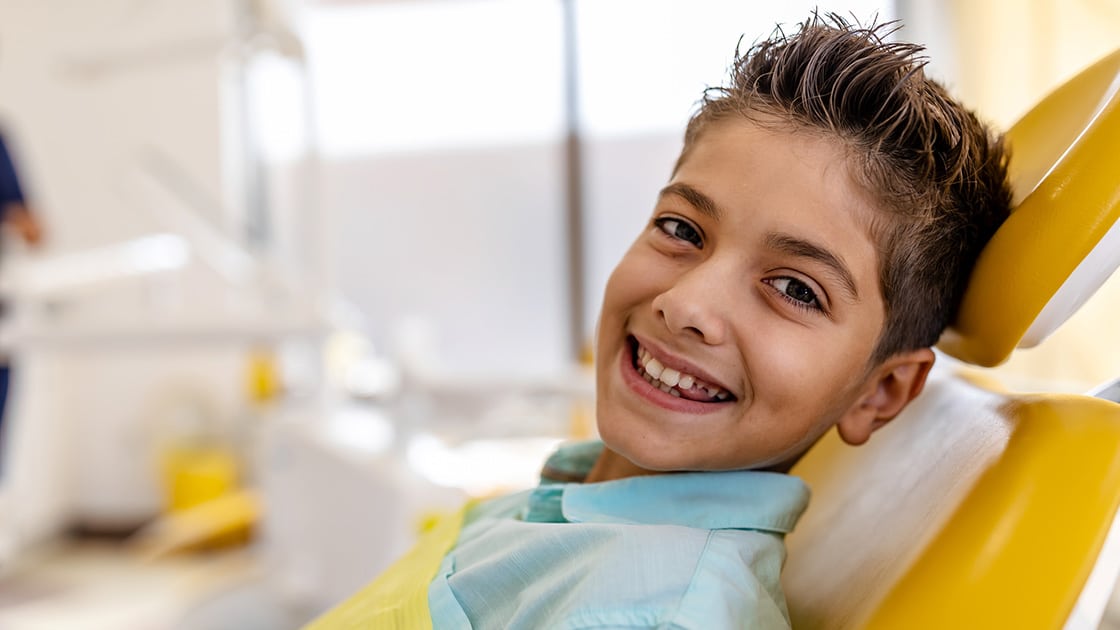 Young Boy In Dental Chair